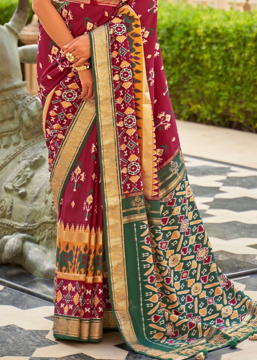 Red & Green Patola Silk Saree with Zari Border & Tassels On Pallu