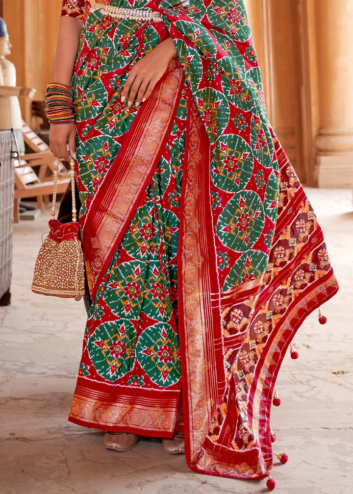 Green & Red Printed Patola Silk Saree with Zari Border & Tassels on Pallu