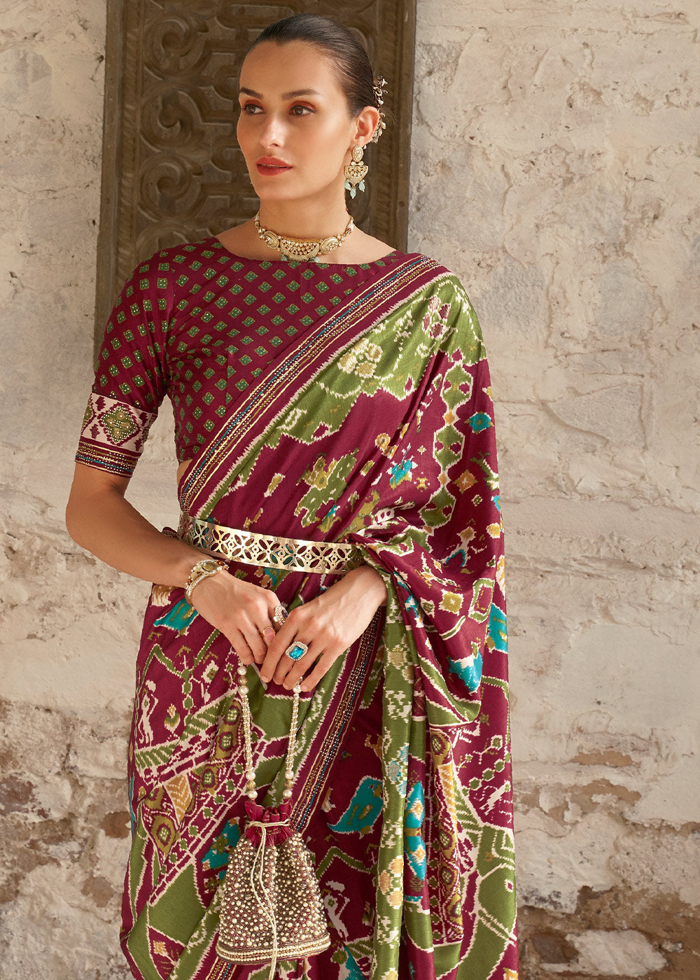 Brown & Green Printed Patola Silk Saree with Zari Border & Tassels on Pallu