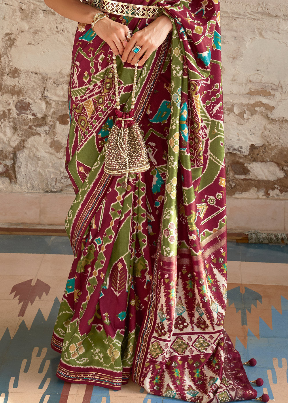 Brown & Green Printed Patola Silk Saree with Zari Border & Tassels on Pallu