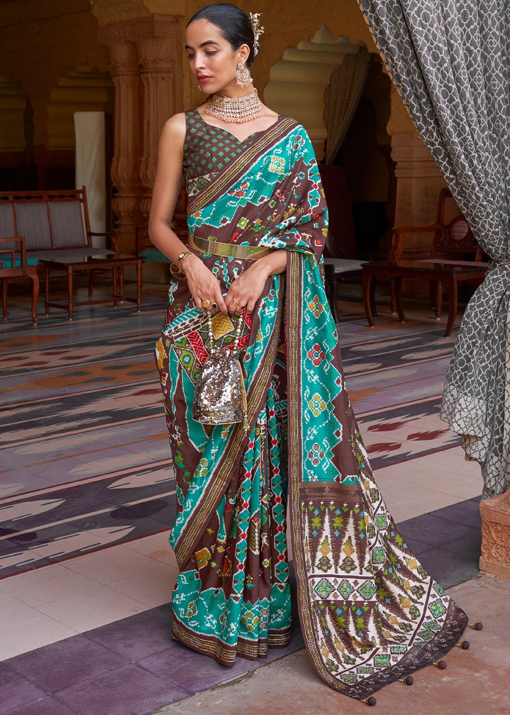 Blue & Brown Printed Patola Silk Saree with Zari Border & Tassels on Pallu