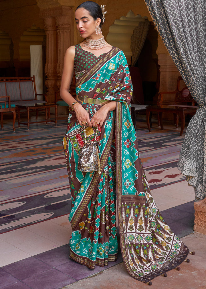 Blue & Brown Printed Patola Silk Saree with Zari Border & Tassels on Pallu