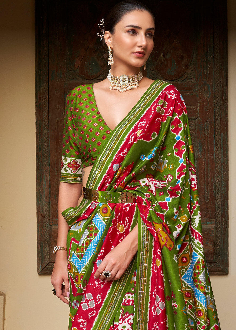 Kelly Green Printed Patola Silk Saree with Zari Border & Tassels on Pallu