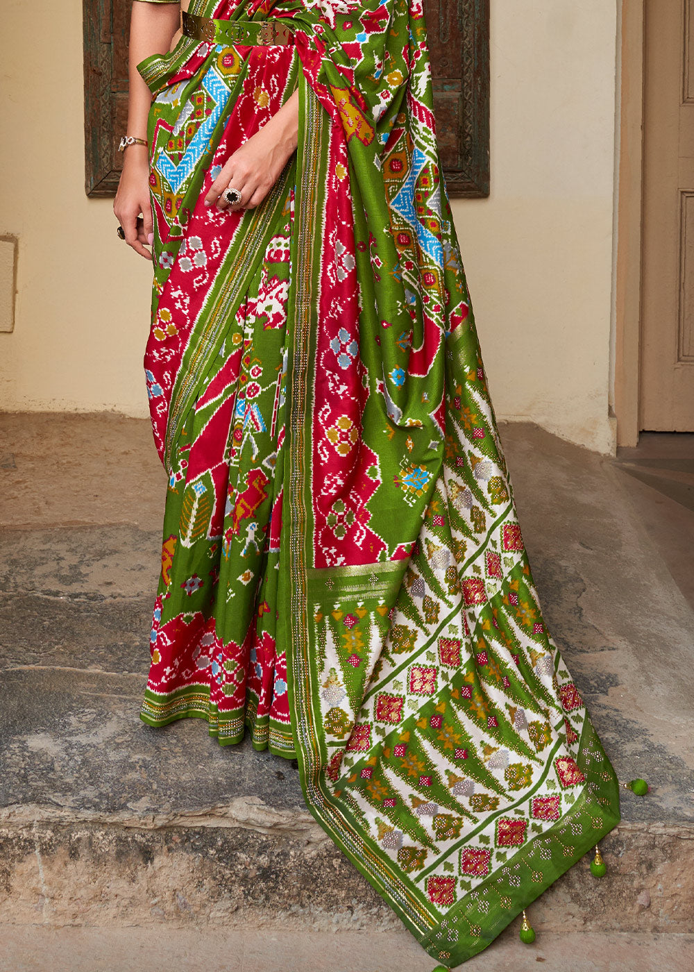 Kelly Green Printed Patola Silk Saree with Zari Border & Tassels on Pallu