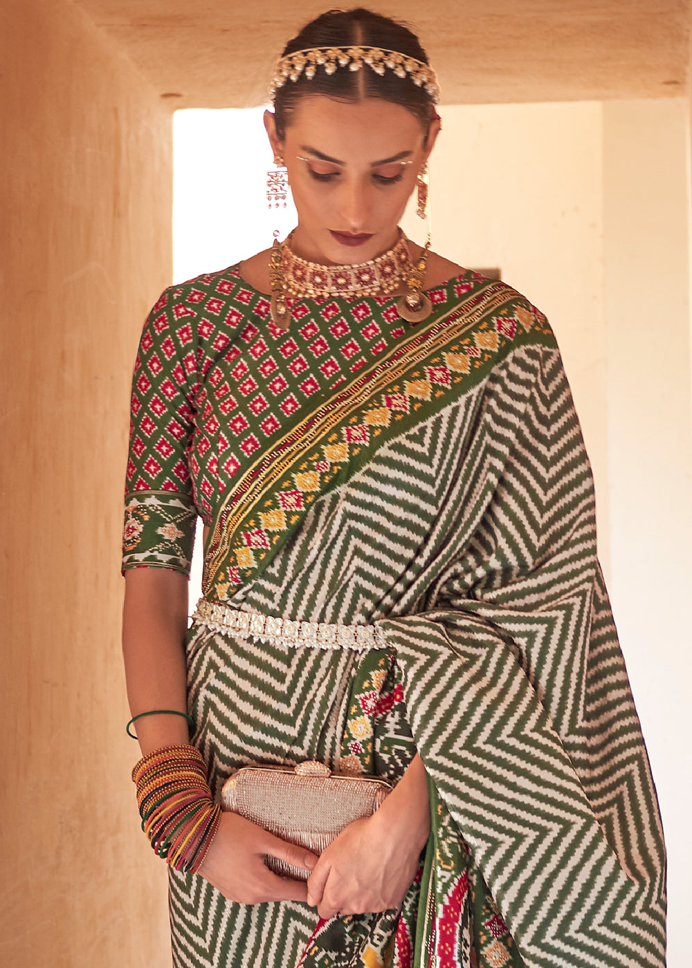 Shades Of Green Printed Patola Silk Saree with Zari Border & Tassels on Pallu