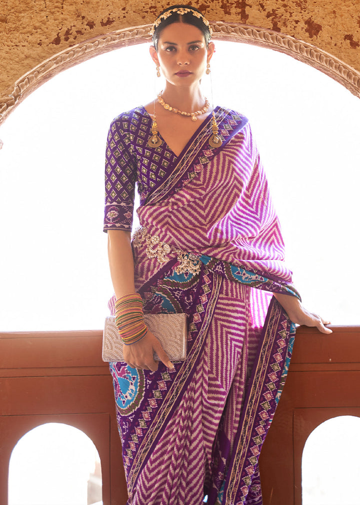 Shades Of Purple Printed Patola Silk Saree with Zari Border & Tassels on Pallu