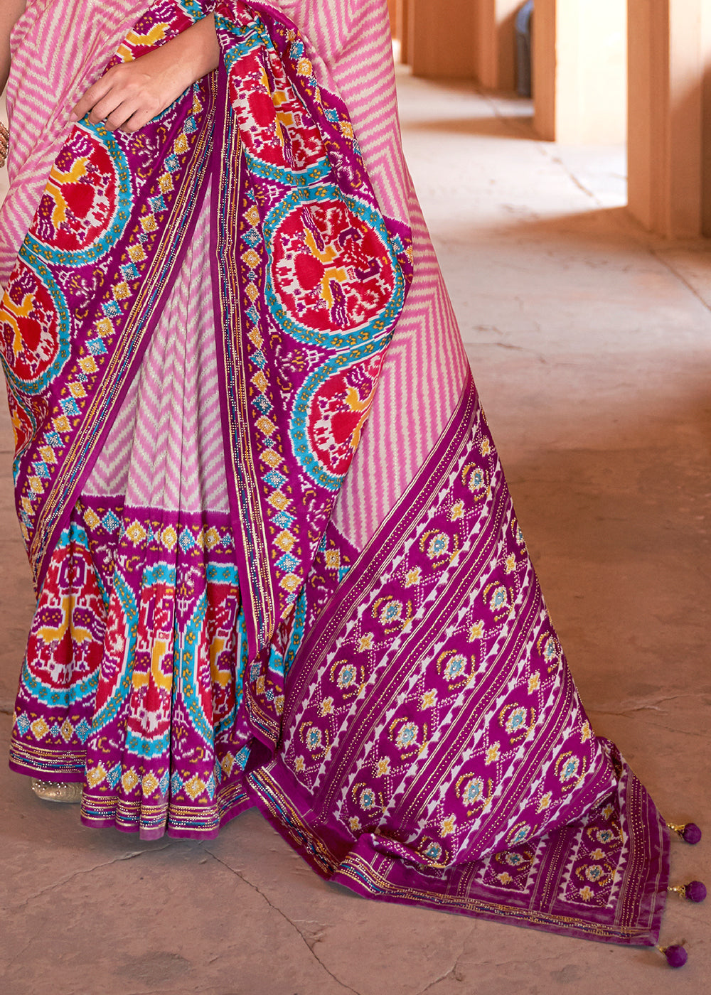 Pink & Purple Printed Patola Silk Saree with Zari Border & Tassels on Pallu