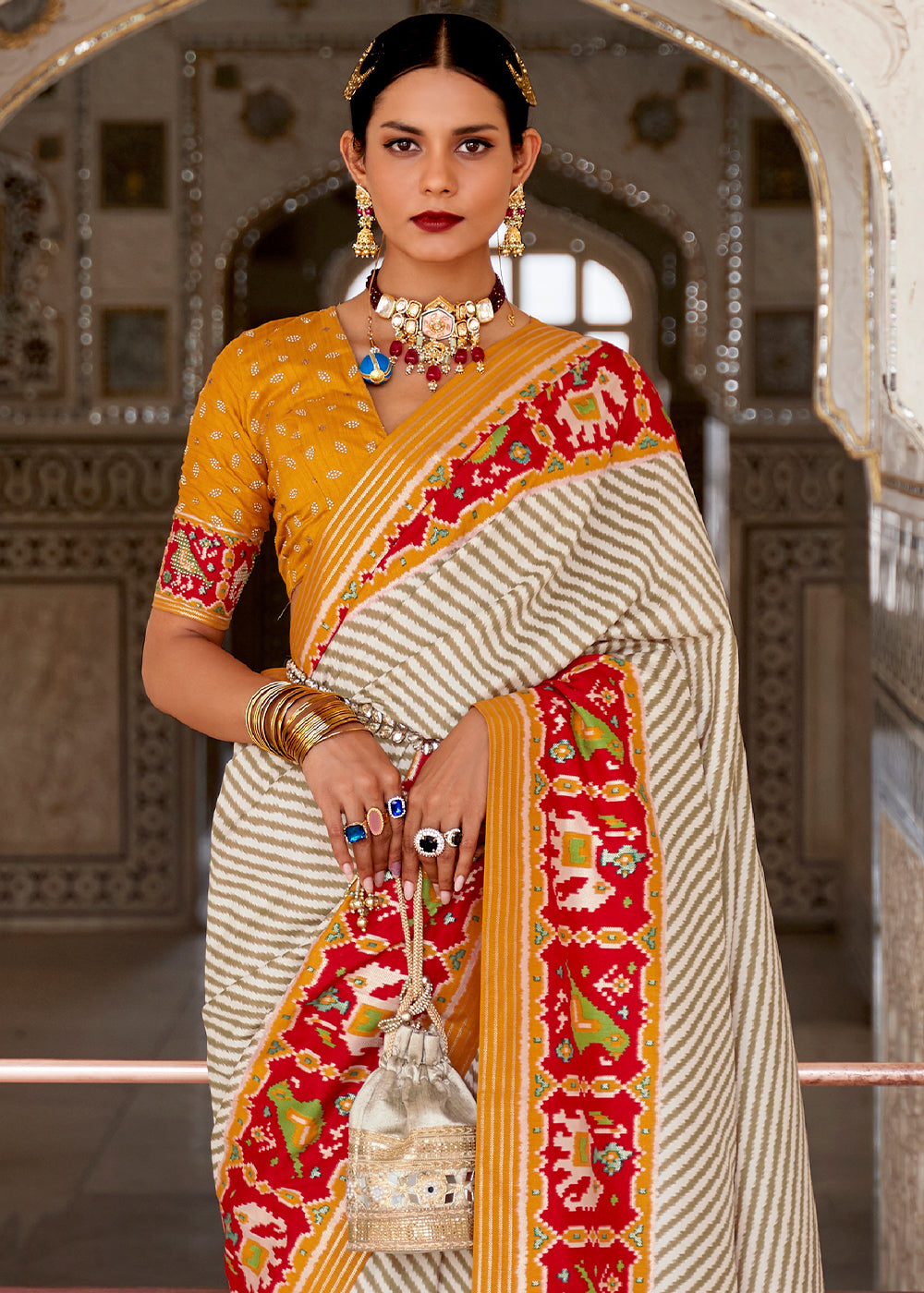 White & Orange Patola Printed Soft Cotton Silk Saree with Zari Border