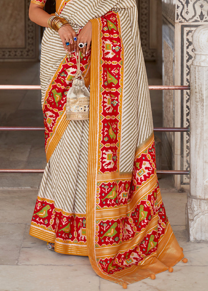 White & Orange Patola Printed Soft Cotton Silk Saree with Zari Border