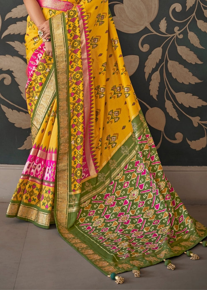 Yellow & Green Patola Silk Saree with Zari Border & Tassels On Pallu