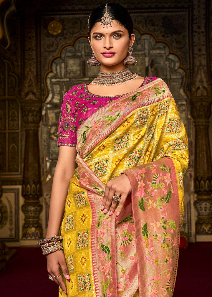 Cadmium Yellow Woven Patola Printed Dola Silk Saree with Heavy Embroidered Blouse