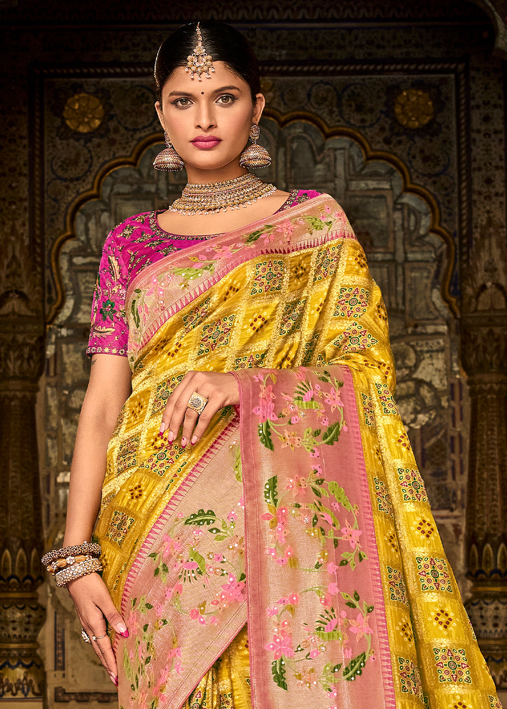 Cadmium Yellow Woven Patola Printed Dola Silk Saree with Heavy Embroidered Blouse