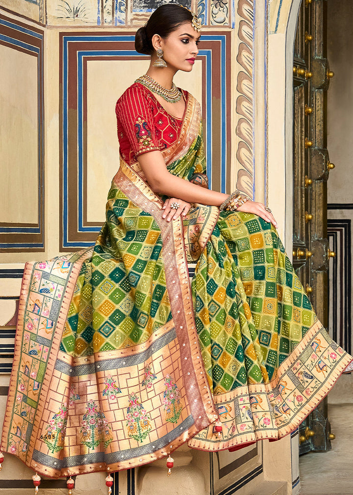 Shades Of Green Woven Patola Printed Dola Silk Saree with Heavy Embroidered Blouse