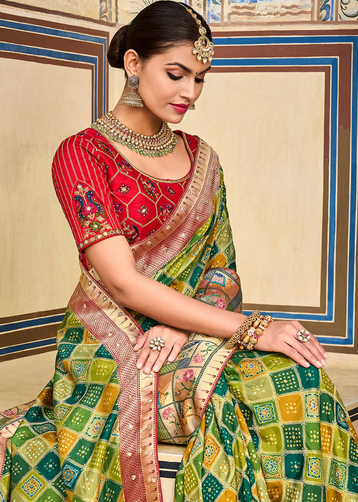 Shades Of Green Woven Patola Printed Dola Silk Saree with Heavy Embroidered Blouse