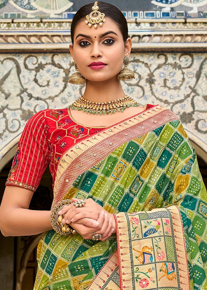 Shades Of Green Woven Patola Printed Dola Silk Saree with Heavy Embroidered Blouse