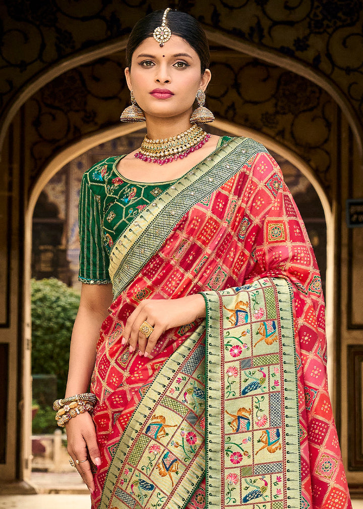 Shades Of Red Woven Patola Printed Dola Silk Saree with Heavy Embroidered Blouse