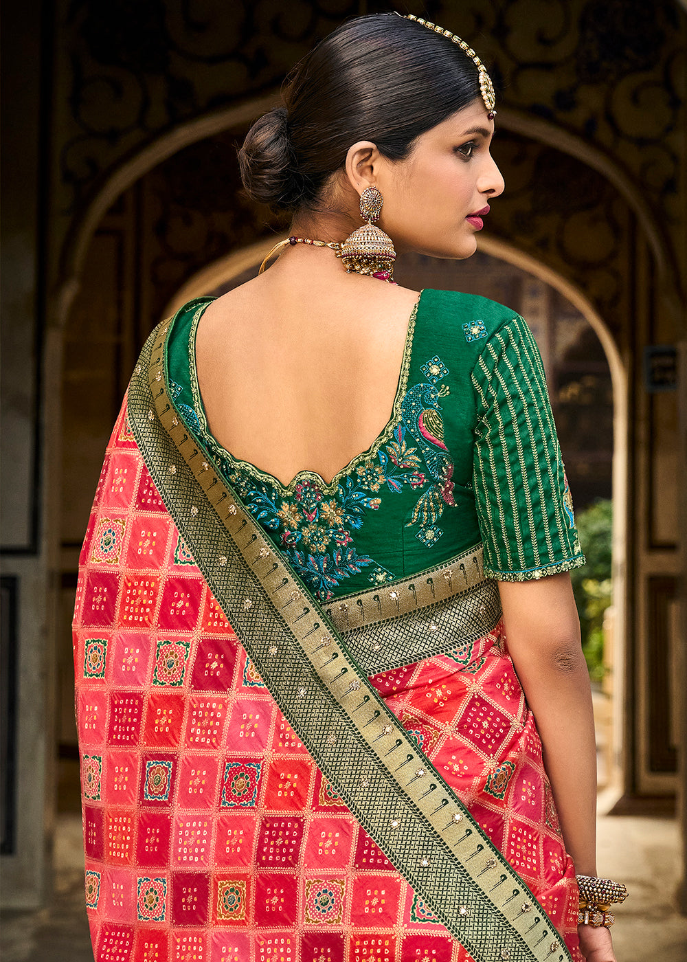 Shades Of Red Woven Patola Printed Dola Silk Saree with Heavy Embroidered Blouse