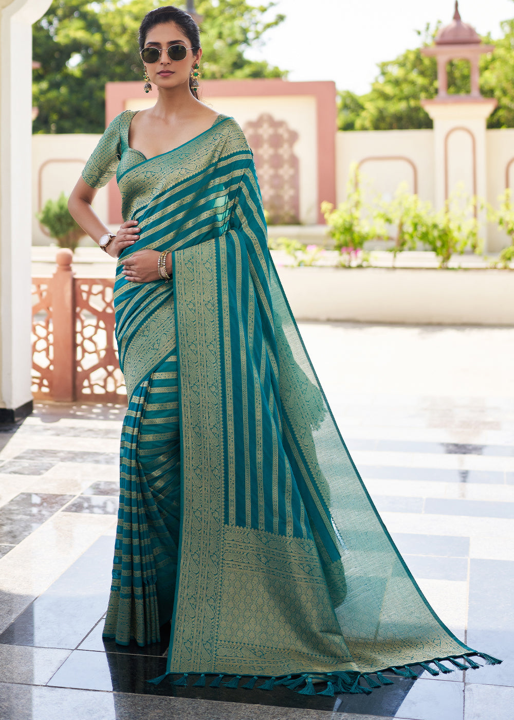 Teal Blue Zari Woven Leheriya Georgette Saree