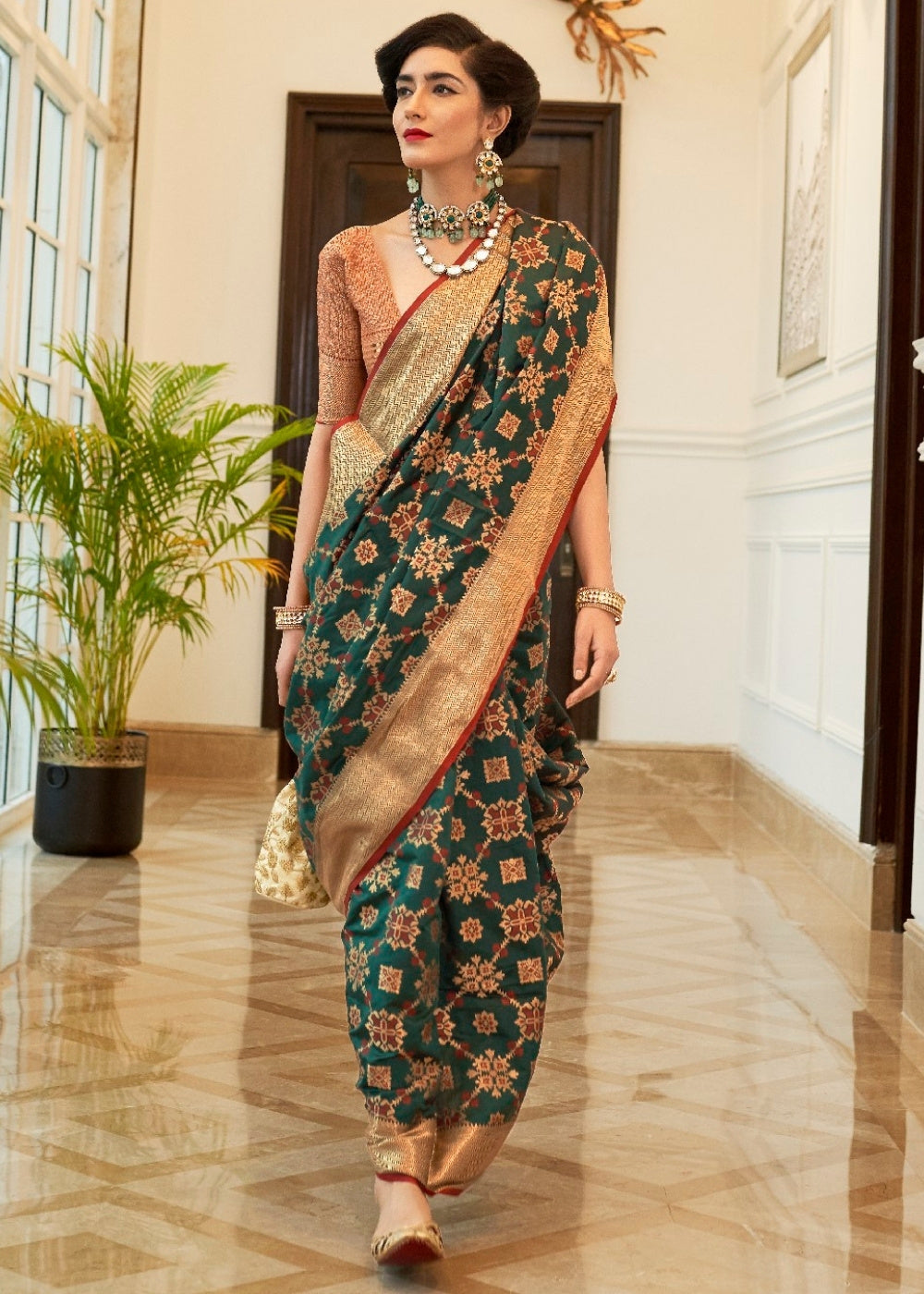 Dark Green Patola Silk Saree with Golden Border