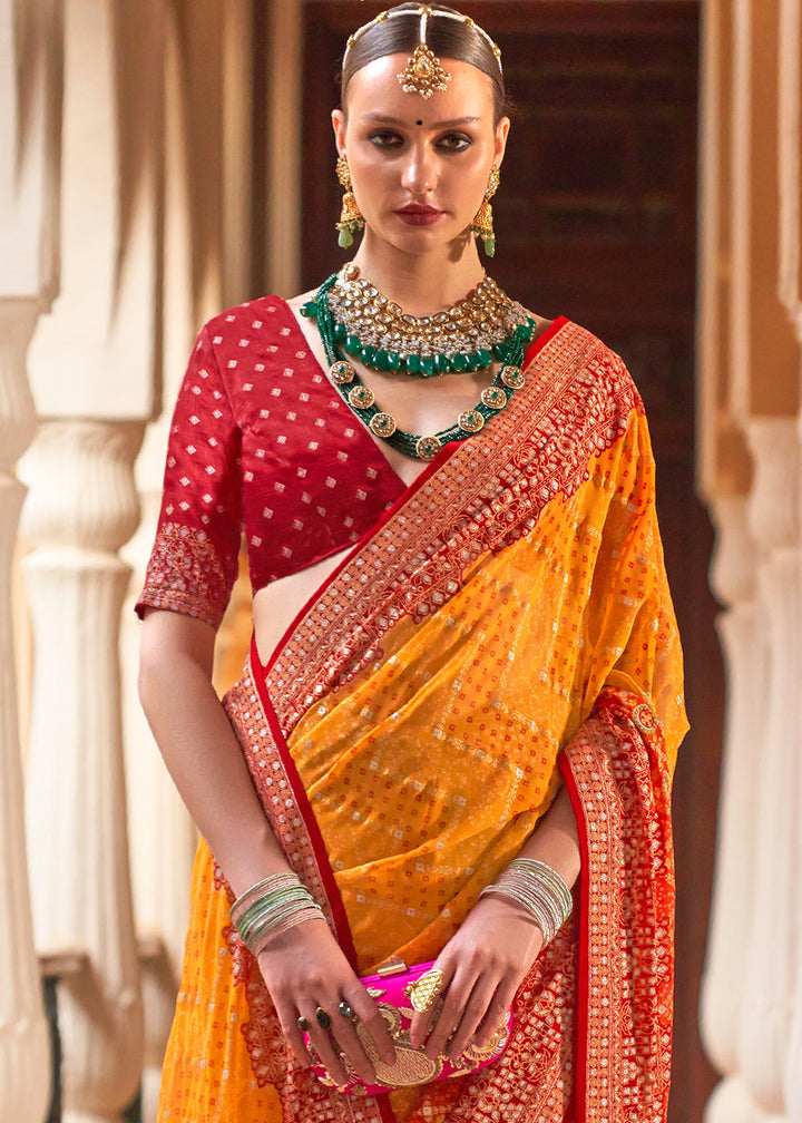 Saffron Yellow Leheriya Printed Georgette Saree