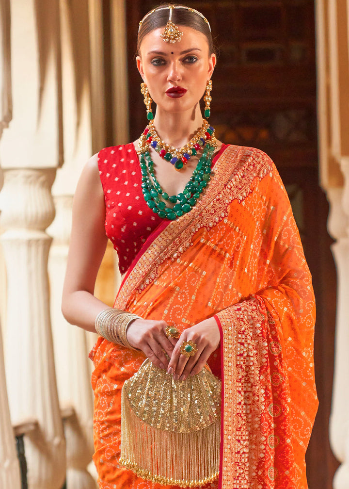 Portland Orange & Yellow Leheriya Printed Georgette Saree