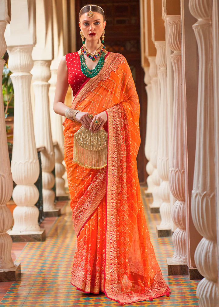 Portland Orange & Yellow Leheriya Printed Georgette Saree