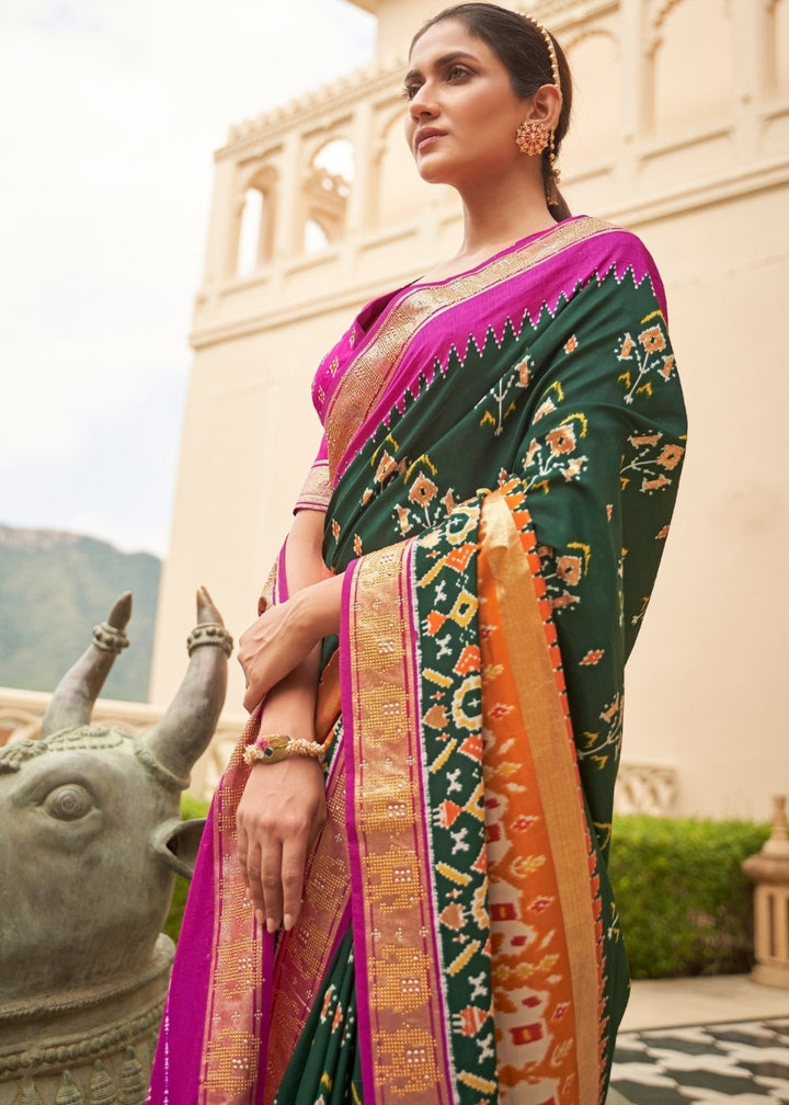 Green & Pink Patola Silk Saree with Zari Border & Tassels On Pallu