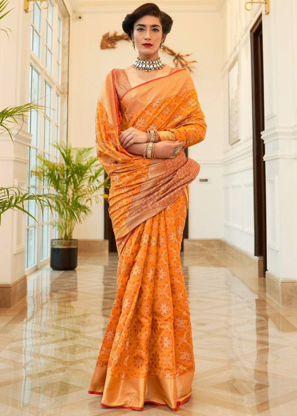 Orange Patola Silk Saree with Jaal work Border