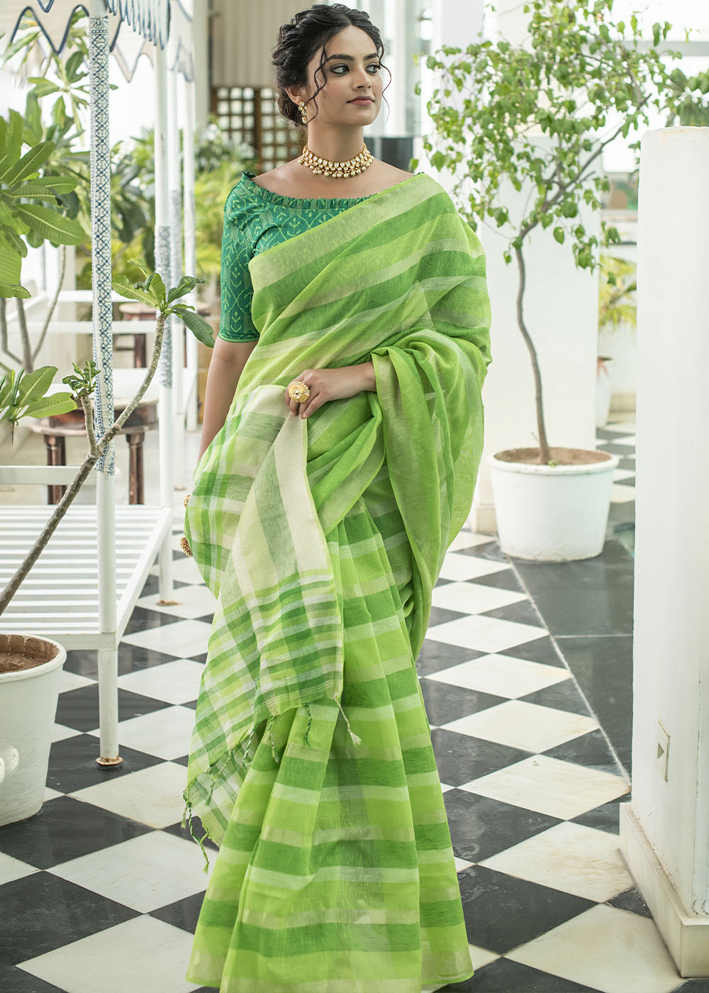 Shades Of Green Linen Saree having Zari Woven Stripes