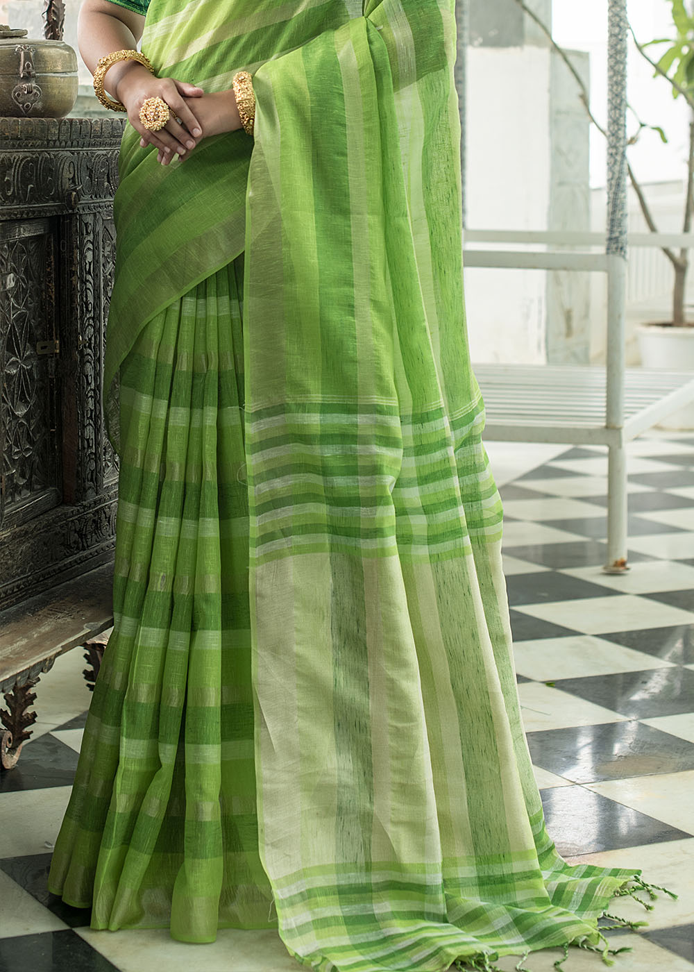 Shades Of Green Linen Saree having Zari Woven Stripes