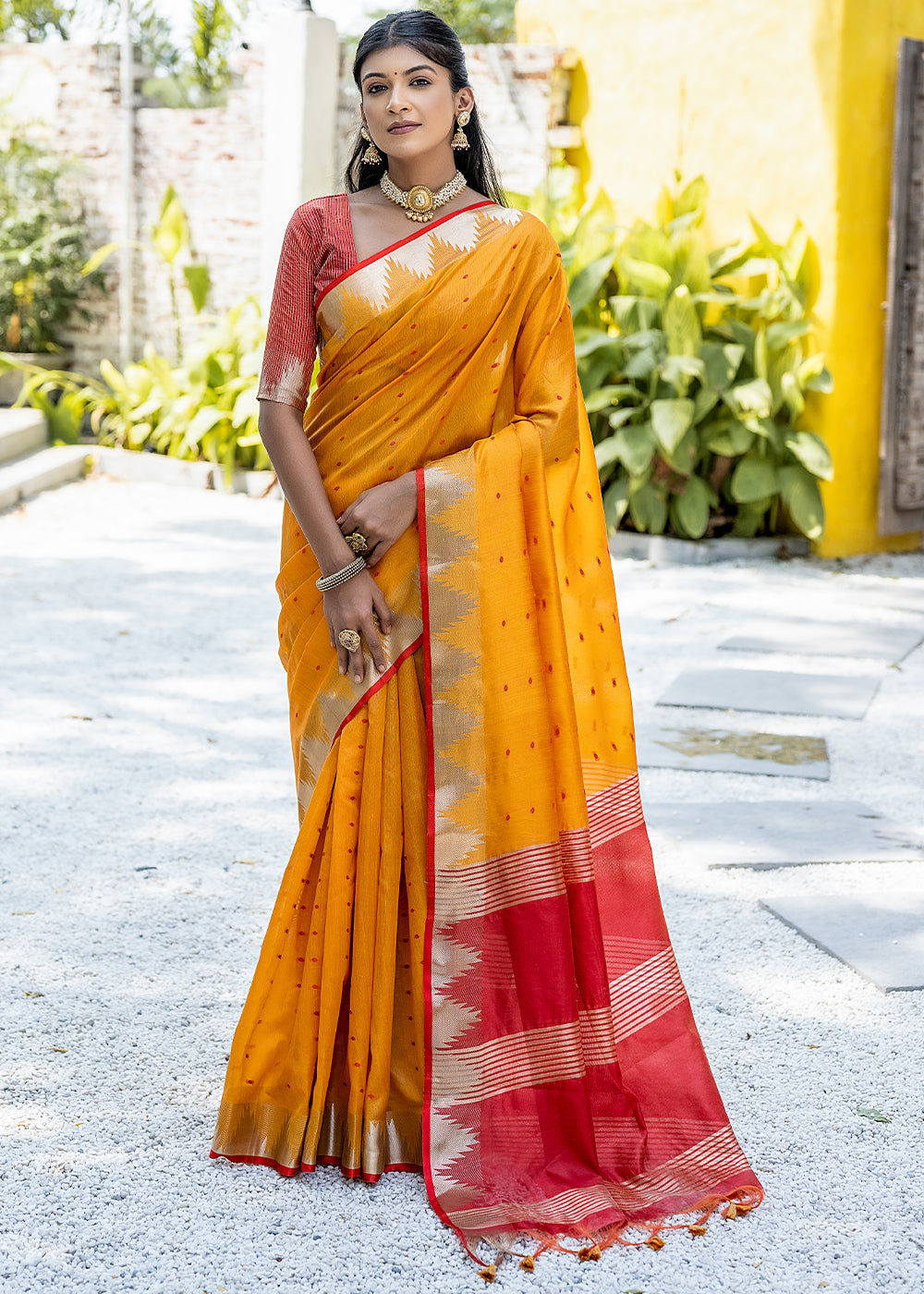 Saffron Yellow Zari Woven Triangle Border Raw Silk Saree with Butti Overall