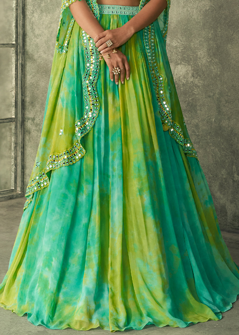 Shades Of Green Silk Embroidered Blouse with Tie Dye Georgette Skirt with Cutdana Embellished Waistline