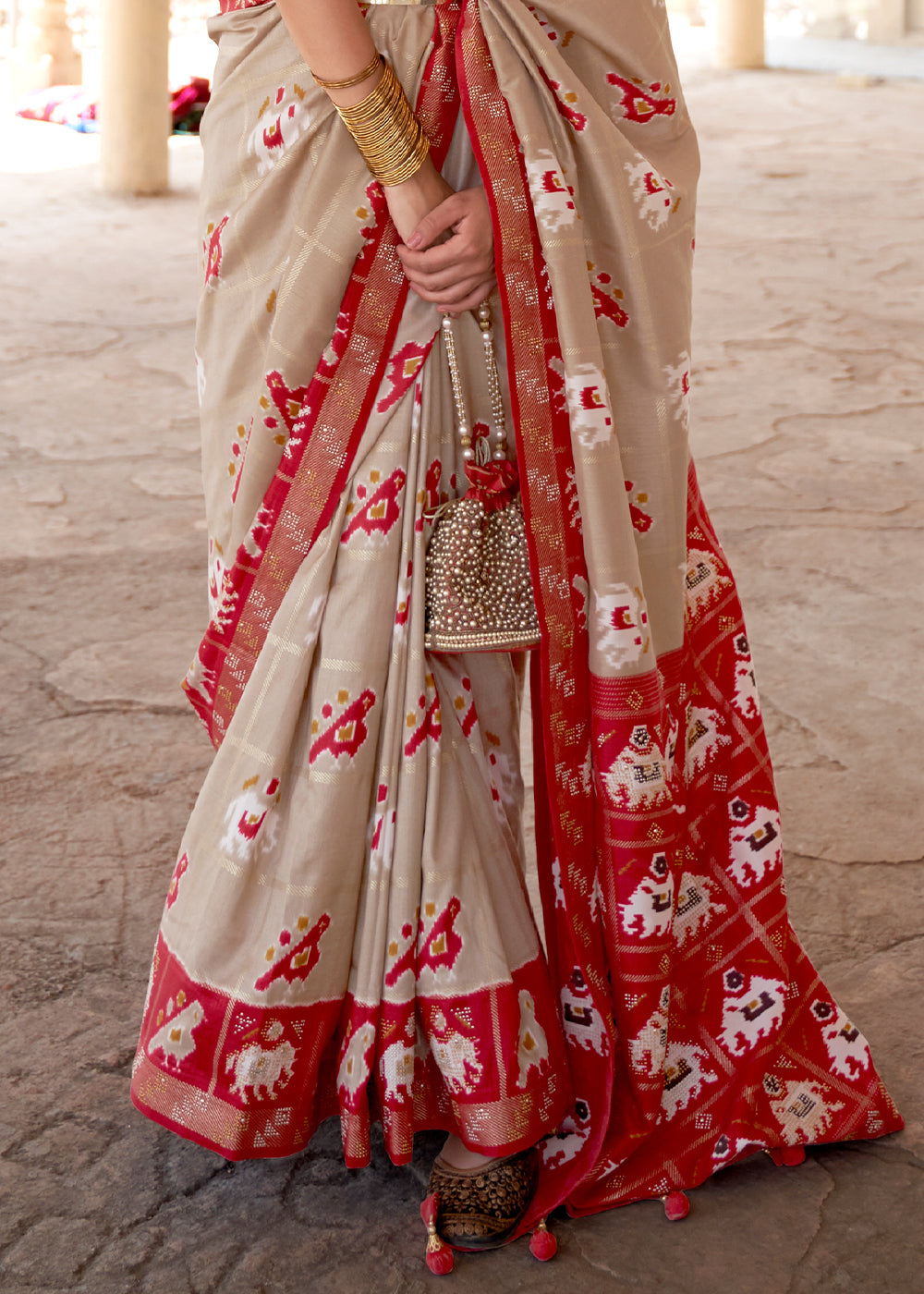 Oat Brown Printed Patola Silk Saree with Zari Border & Tassels on Pallu