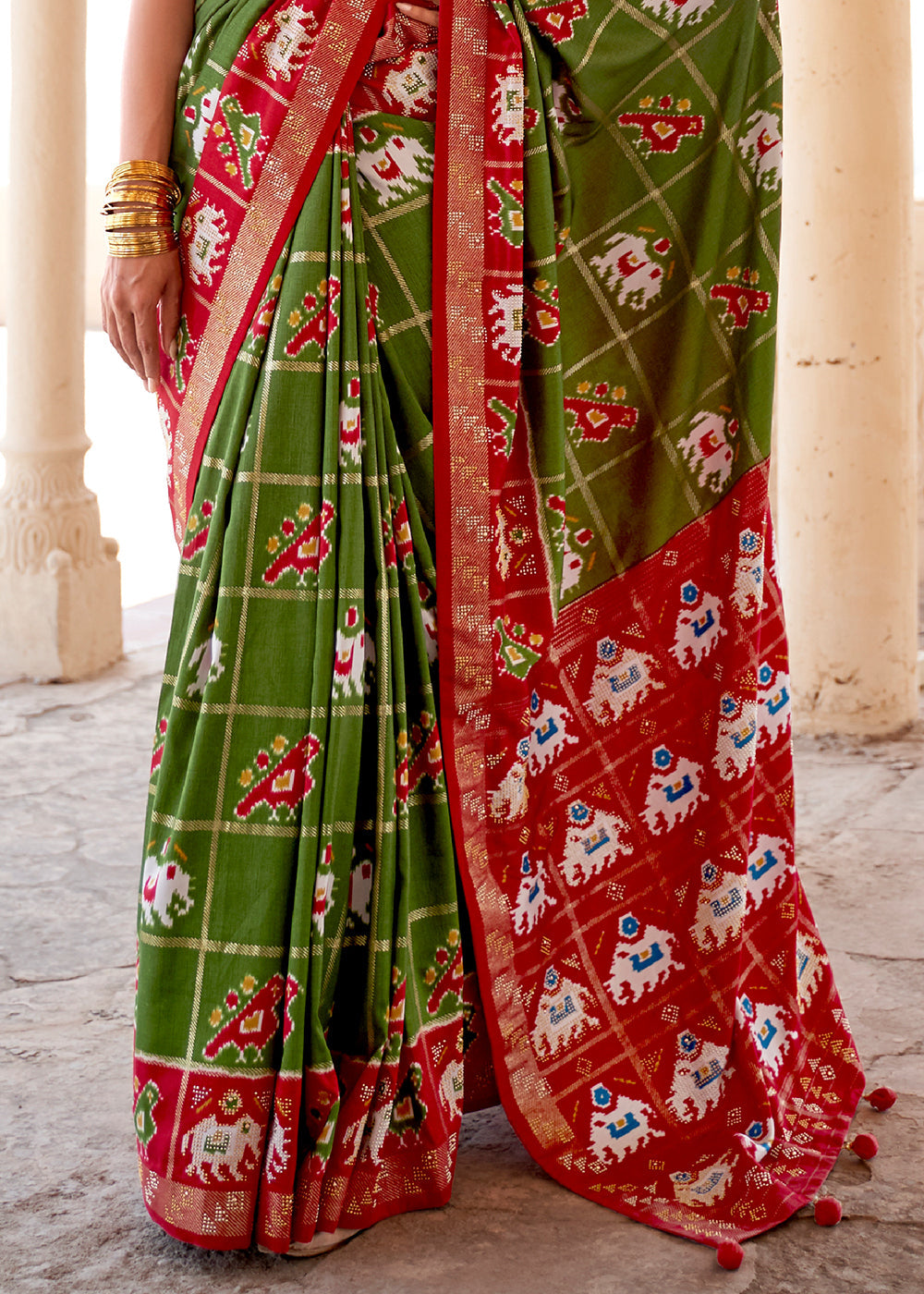 Verdun Green Printed Patola Silk Saree with Zari Border & Tassels on Pallu