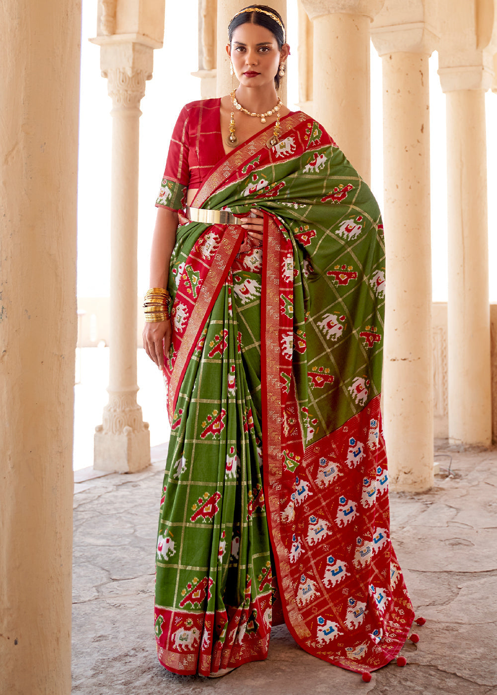 Verdun Green Printed Patola Silk Saree with Zari Border & Tassels on Pallu