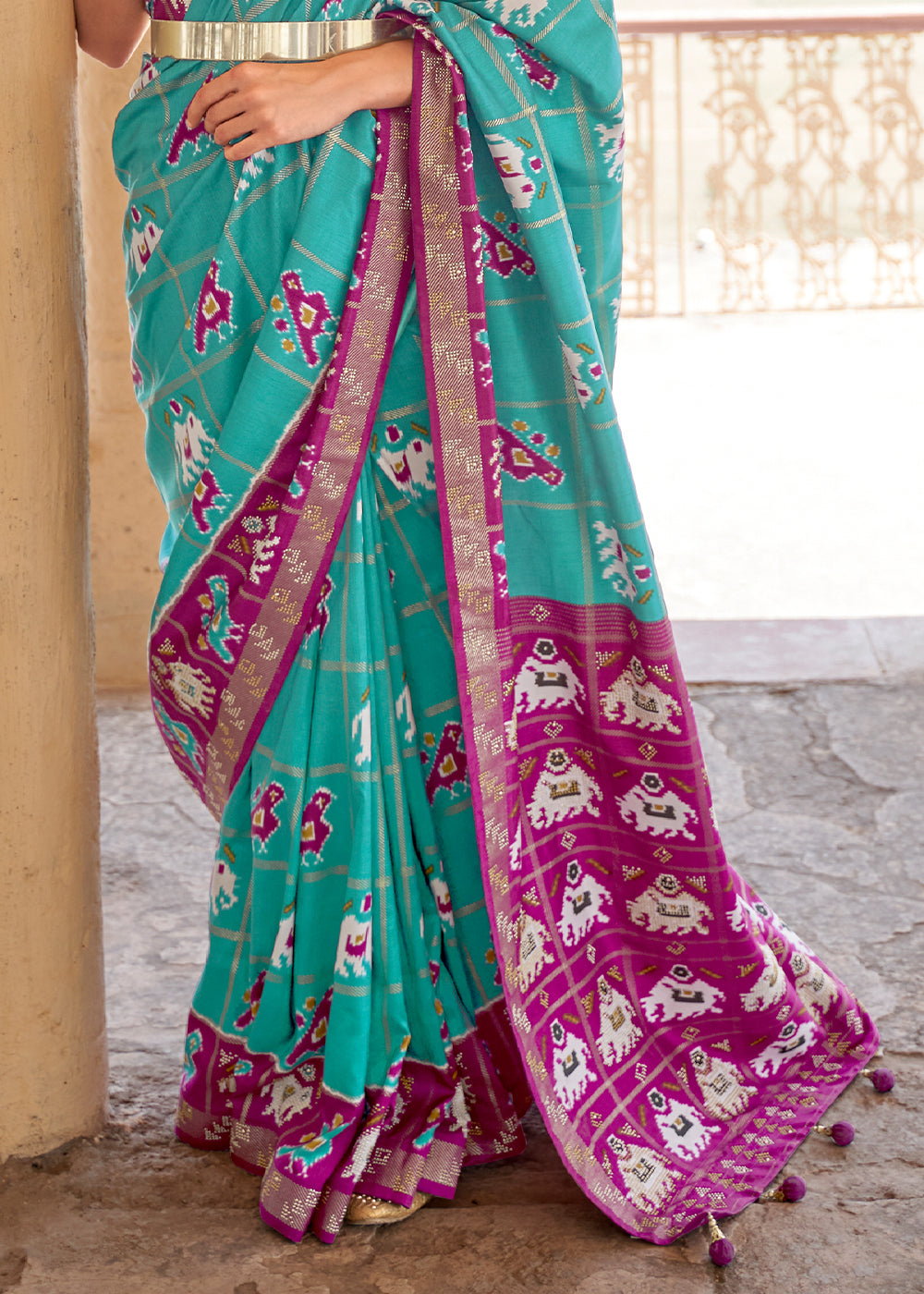 Turquoise Green Printed Patola Silk Saree with Zari Border & Tassels on Pallu