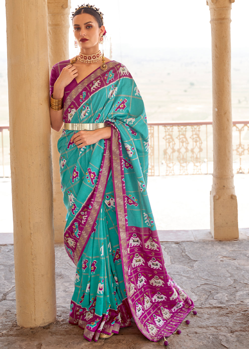 Turquoise Green Printed Patola Silk Saree with Zari Border & Tassels on Pallu