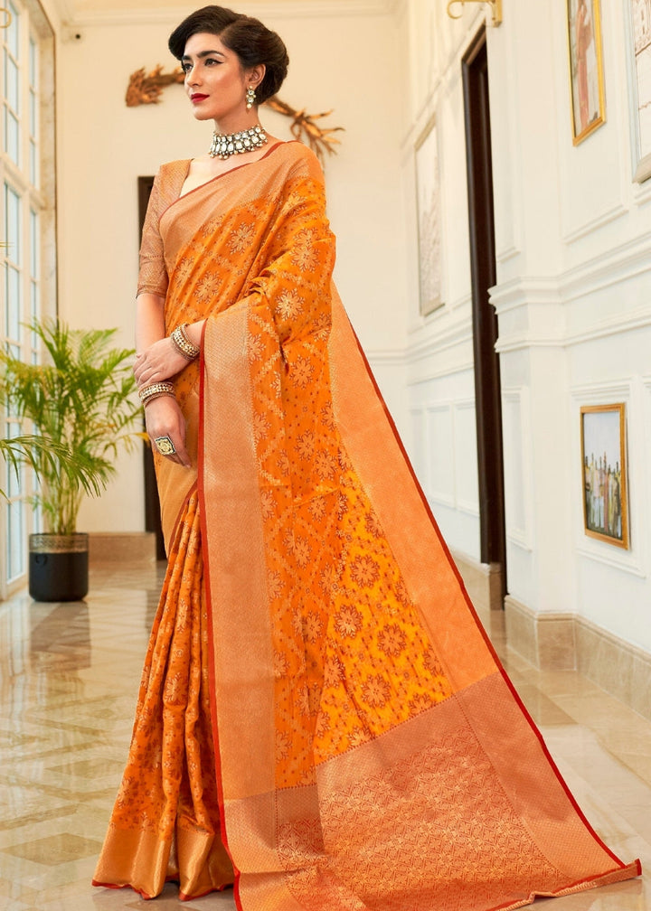 Orange Patola Silk Saree with Jaal work Border